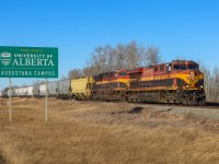 KCSM 4666 and KCS 4036 depart Camrose with a massive 20 car train. 