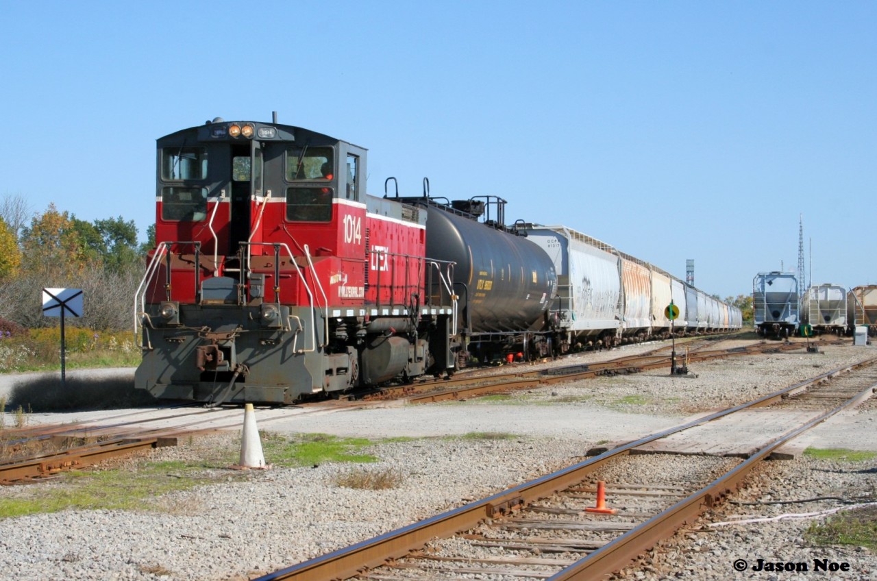 LTEX SW1500 1014 is viewed switching cars by Thorold Townline Road for the large Oxy Vinyls Canada plant located in Port Robinson near the Niagara Falls and Thorold border.