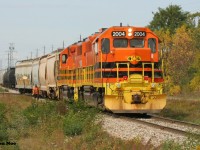 During a fall afternoon, Goderich-Exeter Railway #582 has just come off the North Spur in Guelph, Ontario on the Guelph Junction Railway with QGRY 2004 and GEXR 2073.  