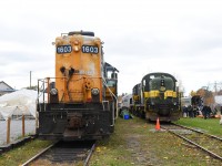 Ontario Northland 1603 has returned to Uxbridge on the first York-Durham Heritage Railway "Pumpkin Patch & Halloween Train" ride of the day.  1603 appears to be the only unit serviceable on the York-Durham; we were told by a volunteer that the YDHR's RS11 and two RS3s "are fried" and will be scrapped in the Spring. The town owns the station and yard property and wants the area cleaned up.  I was later told the locomotives won't be scrapped, so time will tell. There's a lot to look at in this photo: Uxbridge was hit by a tornado in May, 2022 which damaged the station.  The station building is closed awaiting repair, so the railway's gift shop is currently in the white tent to the left of the 1603.  The pylon in the centre of the photo marks the location where the cab window is aligned to stop the train in the correct location.  Passengers are off to the right picking out their pumpkin in the pumpkin patch, except the Mom and little girl who was so upset her face was as pink as her coat.  I don't miss the days when my boys were that young!    