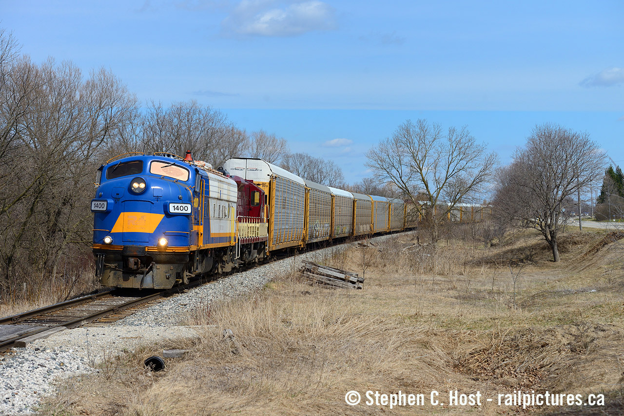 Nearing Beachville, OSR 1400 is westbound on the St. Thomas Subdivision where you can easily follow the boys by driving beside them on Beachville Road. Formerly known as VIA 6539, this locomotive has been promised to the Via Rail Historical Association and They are looking for your help!. While it's too bad 1400 will be leaving OSR, it's been out of service for a few years and  hopefully it will have a nice long life in preservation. When was the last time 1400 was seen in service? anyone know?