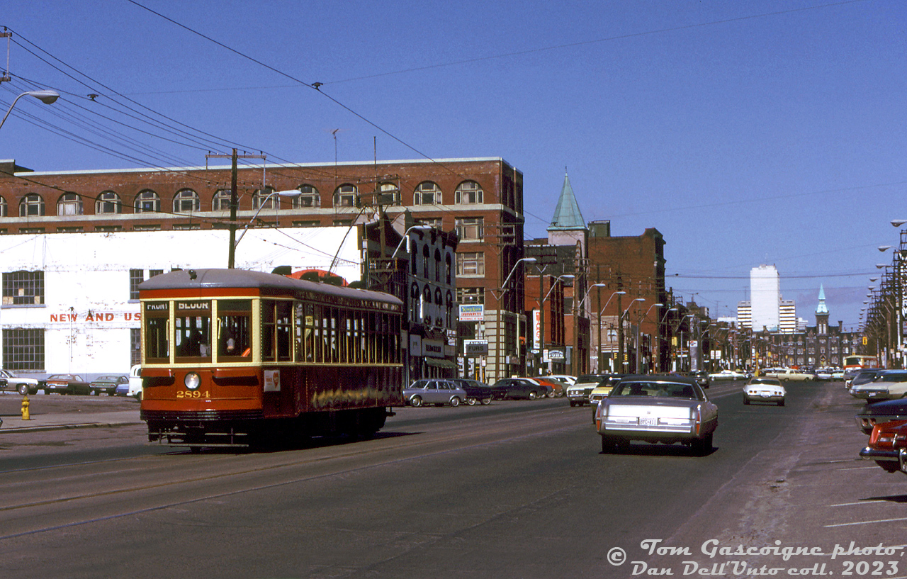 Restored the previous year for Tour Tram service, TTC Peter Witt streetcar 2894 is seen travelling southbound on Spadina Avenue at Sullivan Street. Way off in the distance is the old Knox College building (1 Spadina Crescent) just past Spadina and College.

Tom Gascoigne photo, Dan Dell'Unto collection slide.