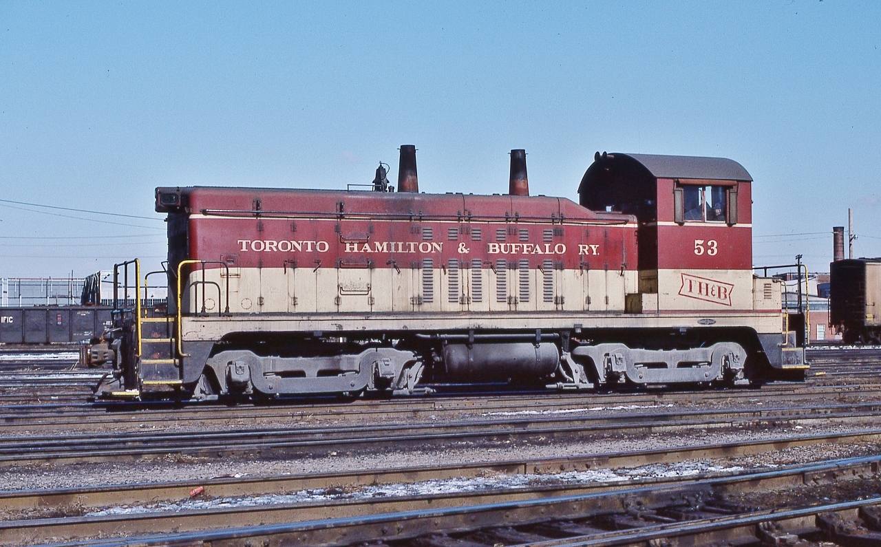 simply simple:  EMD 1947 built  NW2


and time for the brakeman to catch up on the latest in the Hamilton Spectator


TH&B 53 at  Aberdeen, on a snowless February 19, 1977 Kodachrome by S.Danko