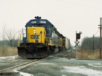 Another shot of a train I offered up before, a few years ago; but something decent is worth more than one passing image, is it not?  This is CSX 8221 and 6218 passing the old "Stop, Look and Listen" crossing sign at Crowland and Biggar Rd as the train heads westbound from crossing the US border.