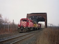 I guess you could say it was a typical non-descript day in December. A blank grey sky had me looking for a location to shoot trains that at least had some 'feeling' to it. So I wandered over to CN Iron Bridge (mile 7.7) to await #328 which I knew was on the way to Buffalo that morning.  It has today three CPs on the head end; CP 5600, 5422 and 5678.  The yellow loco was still in its previous coat as GATX 2000 from when it toiled as a leased unit on the D&H.