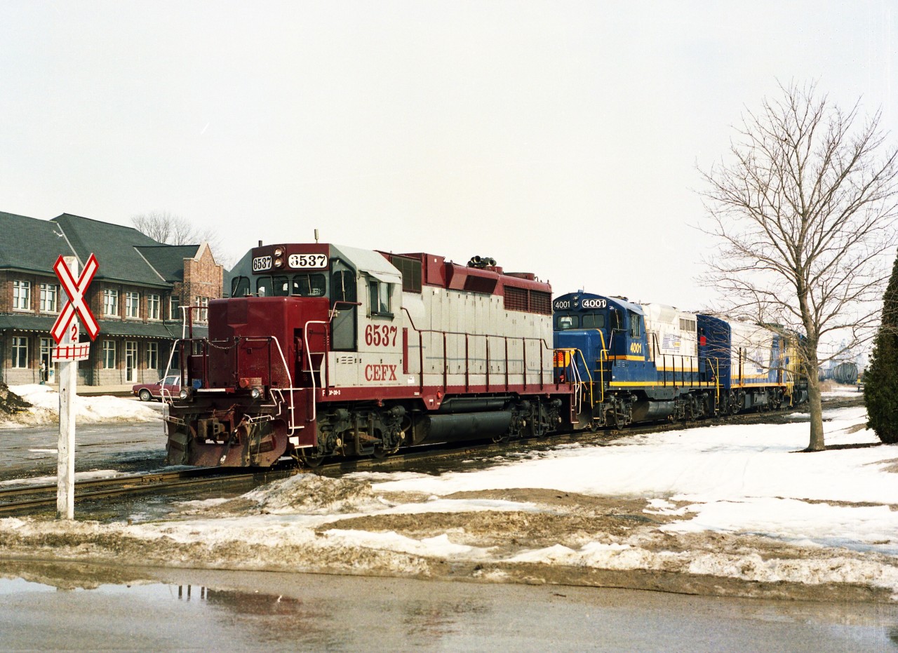 Power that had brought a train down from Goderich is seen moving around the yard.  From the back to the front (as it entered Stratford) is CEFX 6537, RLK 4001, 1401 and GEXR 4046. This is usually a grubby time of the year for shooting, but as of mid-March, although melting, there was still a fair bit of snow on the ground.