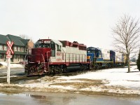 Power that had brought a train down from Goderich is seen moving around the yard.  From the back to the front (as it entered Stratford) is CEFX 6537, RLK 4001, 1401 and GEXR 4046. This is usually a grubby time of the year for shooting, but as of mid-March, although melting, there was still a fair bit of snow on the ground.