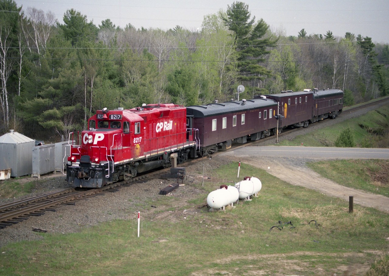 CP's TEC train, led by 8217 is seen heading northward thru Nobel. I recall looking around for something to stand on........but for the life of me cannot remember this nice mound of 'something' was. Followed the train all the way to Cartier, where I think they called it a day. Imaged with 400 ISO Fuji print film in Mamiya 645 camera.