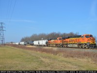CPKC Train #734, with the BNSF duo of 6883 and 6925, head eastbound through Belle River, Ontario on a beautifully clear December 7th, 2023.
