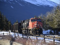 <b> Waiting for clearance </b> <br>
CN 2815 sits at the head end of an empty unit train of aluminum coal hoppers at Mile 0.29 on the Albreda Sub. just a few car lengths from the Hazel Avenue crossing in Jasper, AB. <br<
A new crew has climbed aboard and will begin the move into the yard as soon as they receive clearance to do so. <br>
This was my third day in Jasper on this trip and I was rewarded with clear skies and sunshine for the entire morning before I boarded VIA #2 The Canadian for the trip back to Toronto. :-)