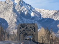 <b> Rock & Steel </b> <br>
Two very imposing sights at CN Henry House, AB Mile 225.8 CN Edson Sub. <br>
The Rocky Mountains, and the CN trestle over the Snaring River where it joins the Athabasca River east of Jasper, AB. <br>
It was a beautiful afternoon to have the whole dome of VIA 8504 Skyline all to myself. Easy to move around front to back and side to side when it's wide open. :-) <br>
Thanks to my friend R.W. for editing the photo.