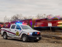 The CPKC Holiday train arrives at Galt Ontario under the watchful eye of the railway police.  The officer was kind enough to pose his truck with the lights on for my photo which combined two of my passions, trains and police vehicles into one photo.  The railway police is a job that often goes overlooked, these men and women work to protect the property surrounding the railway assets.  The officers I spoke with were following the train from Toronto across the Galt and then heading North to go with the Canadian version of the train.  That is a long time away from home!