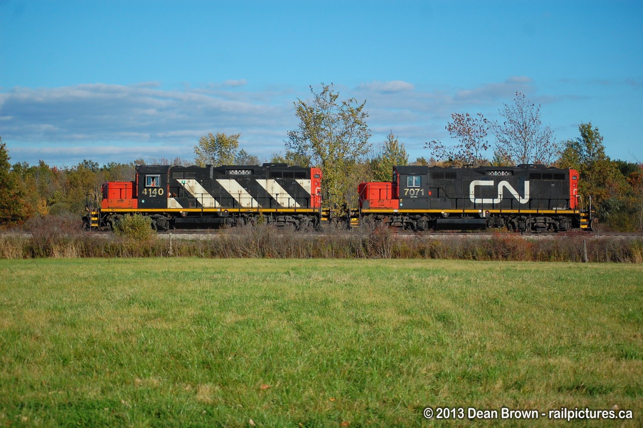 Caught L 56231 14 with CN GP9RM 4140 and CN GP9RM 7071 on the Humberstone Spur at Yager heading westbound back to Port Robinson from Port Colborne on Oct 14, 2013.