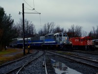 Exporail's first Christmas Train run of the year departs Hays Station amidst light rain/flurries. The white class lights are lit on GP9 AMT 1311 as it passes C-424 CP 4237.