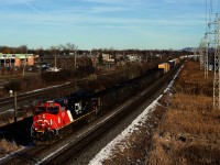 Very little coal moves by rail through Montreal, generally the small amount that does is eastbound or northbound and headed towards Bécancour. So I was quite surprised to see 9 loaded coal hoppers on the head end of westbound CN 369. Here it heads west with CN 3201 up front and CN 3333 mid-train.