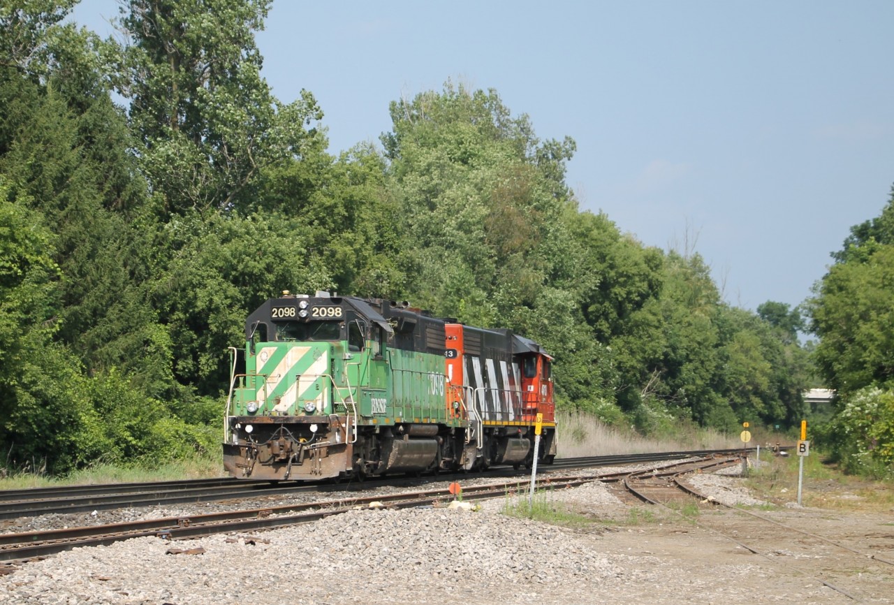 BNSF 2098 is along for the ride as CN 4713 leads L581 running light power eastward on the south track through Copetown at Mile 9.5 Dundas Sub.. Destination maybe Aldershot or Hamilton?