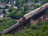 Every once in a while, CN will stick a nose out DPU on a northbound stacker, and every foamers dream can be imagined...reversing directional running....