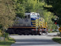 It's hard to sneak through town when you're a 200 car potash train with 2 DPU's. There's a pleasant irony that this Ontario regular bears the same number as the legendary ore trains from Temagami to Hamilton...the trains that brought me into the hobby. 