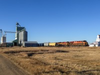 KCSM 4666 rolls through Strome, past the elevator and the seed cleaning co-op. 