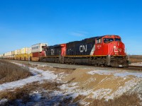 CN 5624 leads Q 10451 08 down the new stretch of double track between Kirby and Jarrow on the Wainwright Sub. 