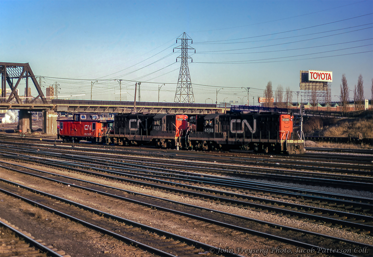 A westbound van hop for Mimico passes beneath Bathurst Street.John Freyseng Photo, Jacob Patterson Collection Slide.