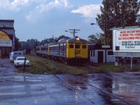 Budd cars from train 632 (now under an unknown deadhead number) is seen departing Stouffville for Spadina near the end of August, 1982.  In the coming days trains 631/632 will make their final runs on Friday, September 3, 1982, with GO Transit assuming operations the following Tuesday, September 7.  The last of Stouffville's elevators survived until 2015.<br><br><i>Scan and editing by Jacob Patterson.</i>