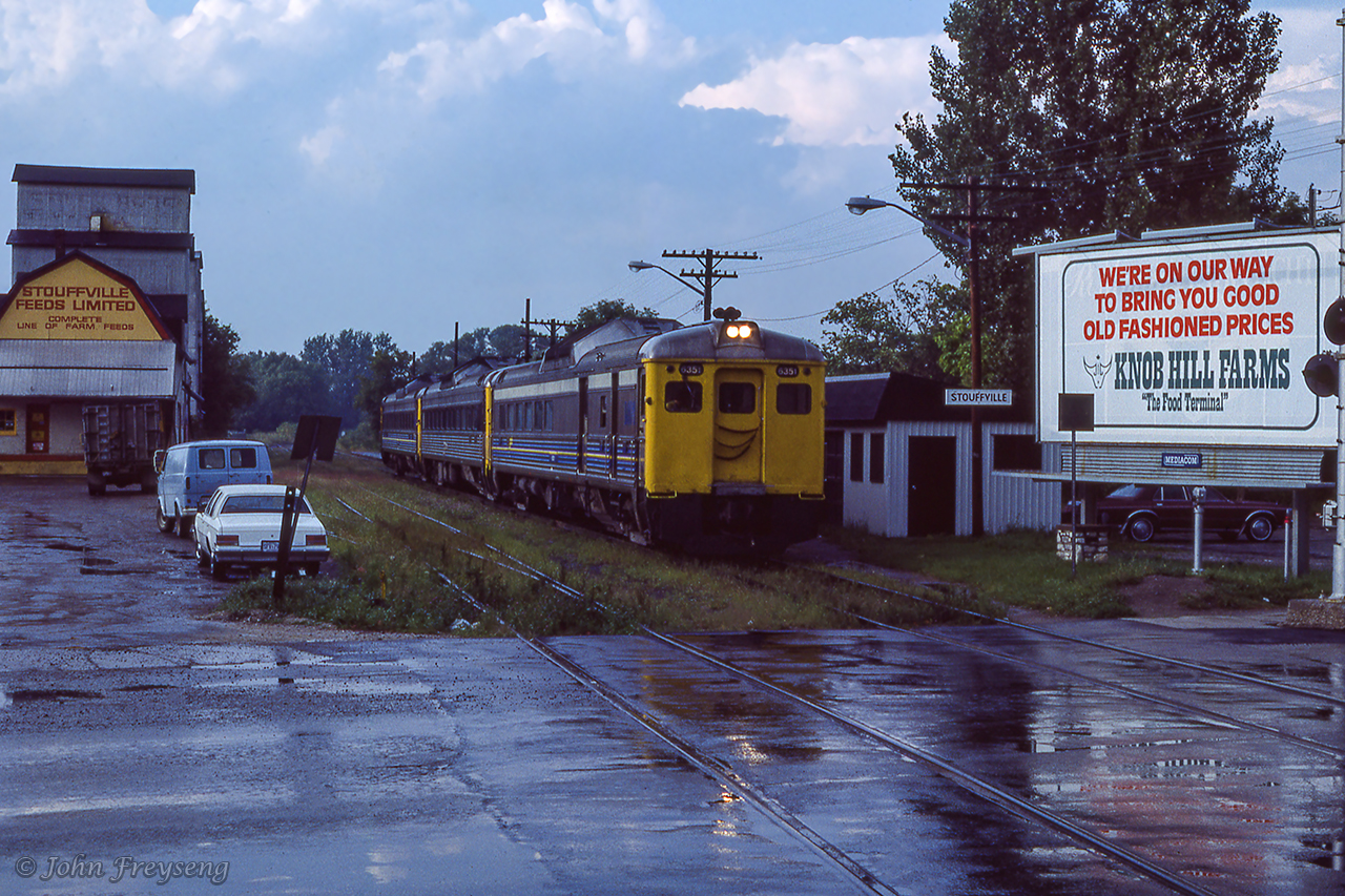 Budd cars from train 632 (now under an unknown deadhead number) is seen departing Stouffville for Spadina near the end of August, 1982.  In the coming days trains 631/632 will make their final runs on Friday, September 3, 1982, with GO Transit assuming operations the following Tuesday, September 7.  The last of Stouffville's elevators survived until 2015.Scan and editing by Jacob Patterson.