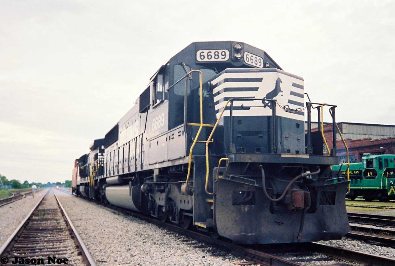 Norfolk Southern 6689 and 3516 along with N&W caboose 555009 were on display in St. Thomas, Ontario during the city's Railway Day’s event held during August 1993.