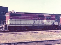 <b> Long hood forward </b> <br>
TH&B 402 sits idling at the Chatham Street engine facility in Hamilton, ON July 12, 1975.