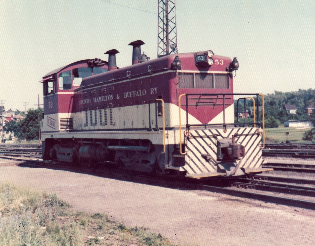 TH&B 53 basks in the sunshine on a beautiful summer day in 1974 at the TH&B Aberdeen Avenue Yard in Hamilton, ON.