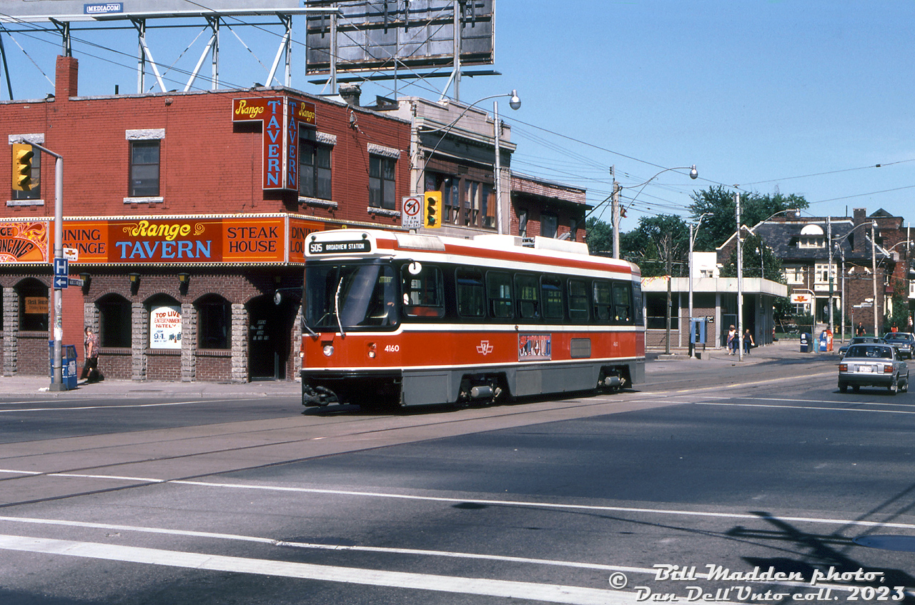 Two year old TTC CLRV 4160 heads southbound on Dundas Street West crossing Bloor Street West, having just departed Dundas West Subway Station in the background on an eastbound Route 505 Dundas run on this sunny afternoon in Toronto. The streetcar is seen passing the Range Tavern at the northwest corner (in more recent times, this whole block of stores had been closed since the late 2000's pending redevelopment into condos). 4160 would be retired in October 2019 as the remaining fleet was being replaced by new Bombardier articulated LFLRV cars.

William (Bill) Madden photo, Dan Dell'Unto collection slide.