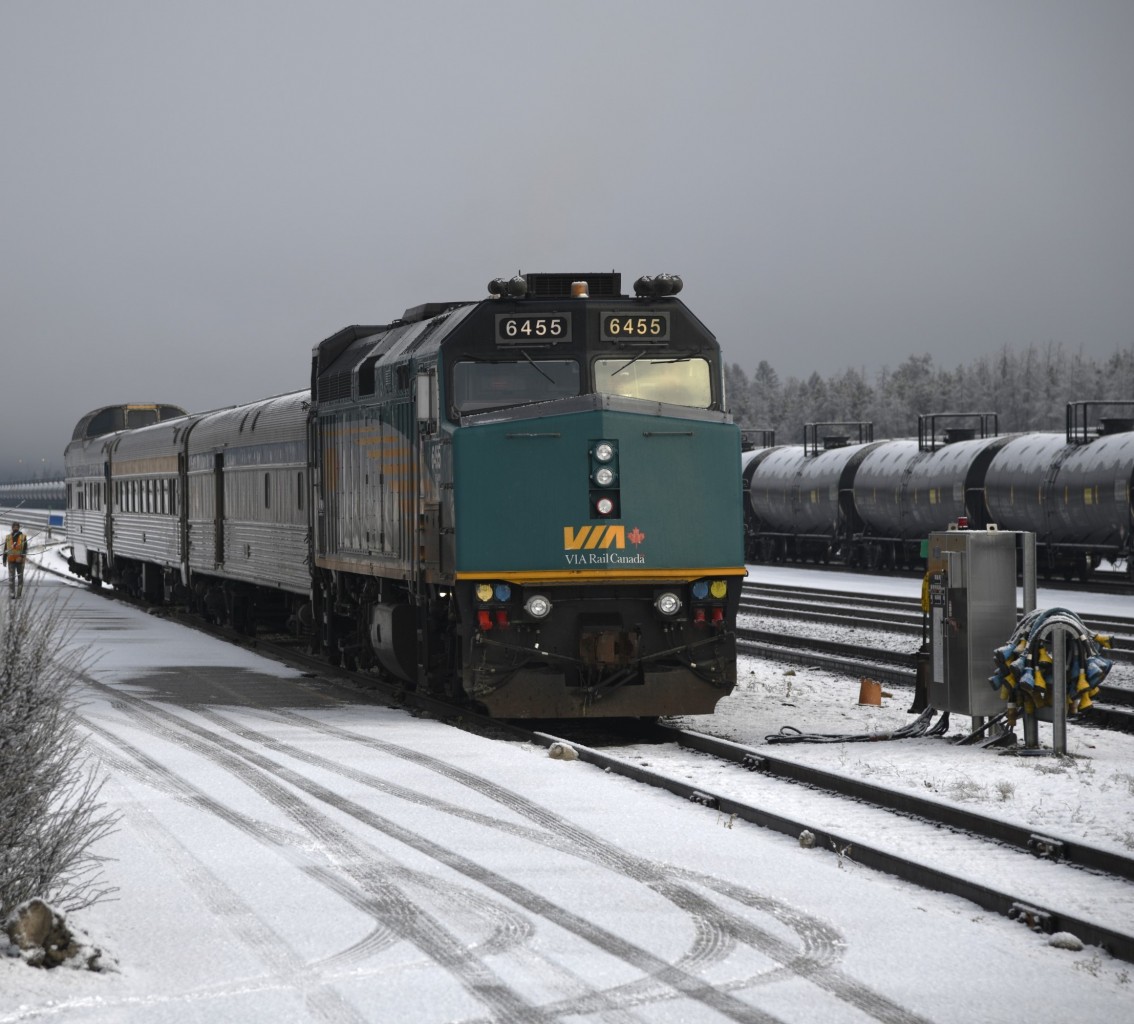 Attention passengers. There will be a slight delay  
VIA #5 The Skeena is all set to pull up to the station and begin boarding passengers at Jasper, AB Mile 235.7 on  CN's Edson Sub. on this overcast, windy, and lightly snowing morning, however, a bad wheel on baggage car VIA 8613 has necessitated a switching move to set the car out causing a delay in the 12:45 scheduled departure. 
Once the baggage car was removed, the new consist for VIA #5 became VIA 6455, VIA 8102 coach, and VIA 8707 Kokanee Park. 
Unknown at the time, the 4-day trip from Jasper, AB to Prince Rupert, BC and return would hold even more surprises for yours truly. :-)