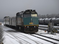 <b> Attention passengers. There will be a slight delay </b> <br>
VIA #5 The Skeena is all set to pull up to the station and begin boarding passengers at Jasper, AB Mile 235.7 on  CN's Edson Sub. on this overcast, windy, and lightly snowing morning, however, a bad wheel on baggage car VIA 8613 has necessitated a switching move to set the car out causing a delay in the 12:45 scheduled departure. <br>
Once the baggage car was removed, the new consist for VIA #5 became VIA 6455, VIA 8102 coach, and VIA 8707 Kokanee Park. <br>
Unknown at the time, the 4-day trip from Jasper, AB to Prince Rupert, BC and return would hold even more surprises for yours truly. :-)
