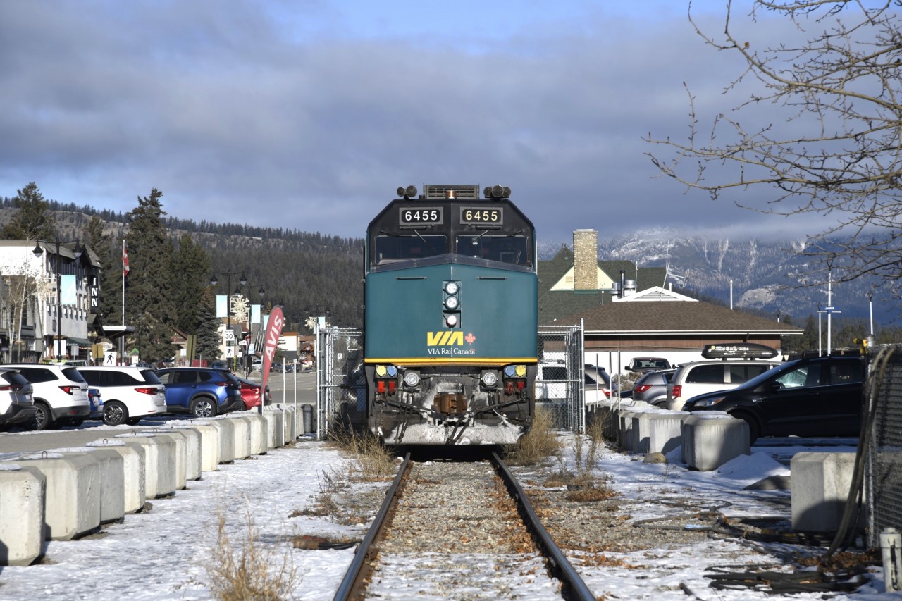 Waiting for the Doctor  
VIA 6455 was dragged into town as the second unit on VIA 006 The Skeena from Prince George, BC the day before. After making multiple switching moves, it has been shoved against the stop block next to the wayside power connections on the shed track just west of the Jasper train station. 
Later in the day the local VIA equipment department truck would pull up, and a technician would begin diagnosing the power problems this unit had been experiencing on it previous run heading up The Skeena.