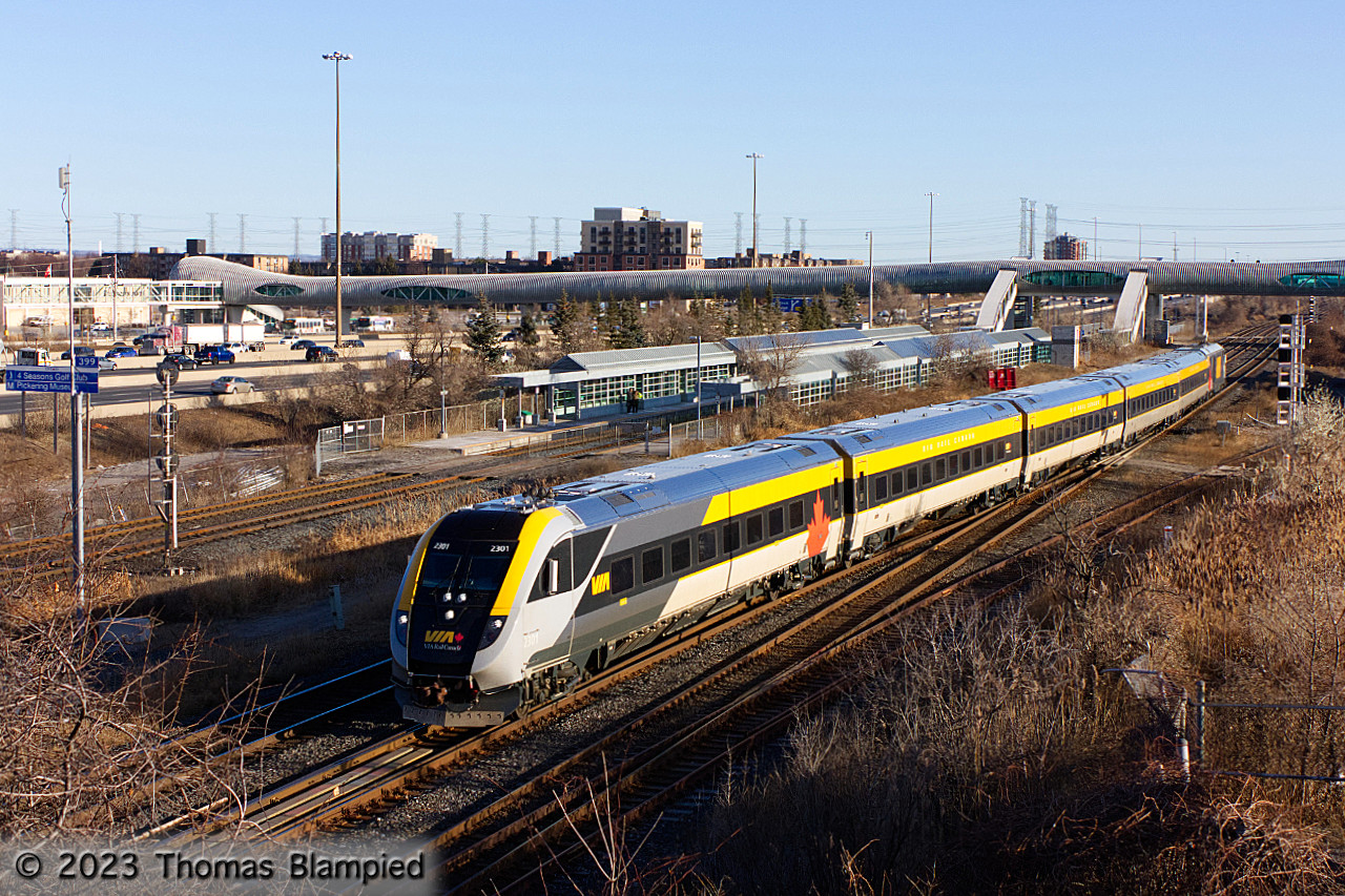 The VIA Venture sets are now making a trip to Toronto six days a week. Running a few minutes late, 2301 and 2202 cross over to the north track at Liverpool with Toronto-bound train 41.