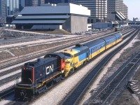 It is Toronto on March 28, 1984 where CN 8515 is moving an Ontario Northern "Northlander" headed by Ontario Northern 1985. VIA 6109 is in the background.