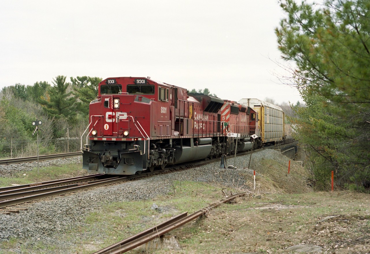 There were only 4 of these SD90MAC-H locomotives on CP, which made them rather difficult to catch. I had very limited success.  It was nice to unexpectedly bag this one while hanging around at CP Reynolds along James Bay Junction Rd, just "waiting for something to happen".  Due to constant reliability problems these units had a short life on CP. Built in 1999 and all retired by 2008 !  Trailing unit is CP 5915.
