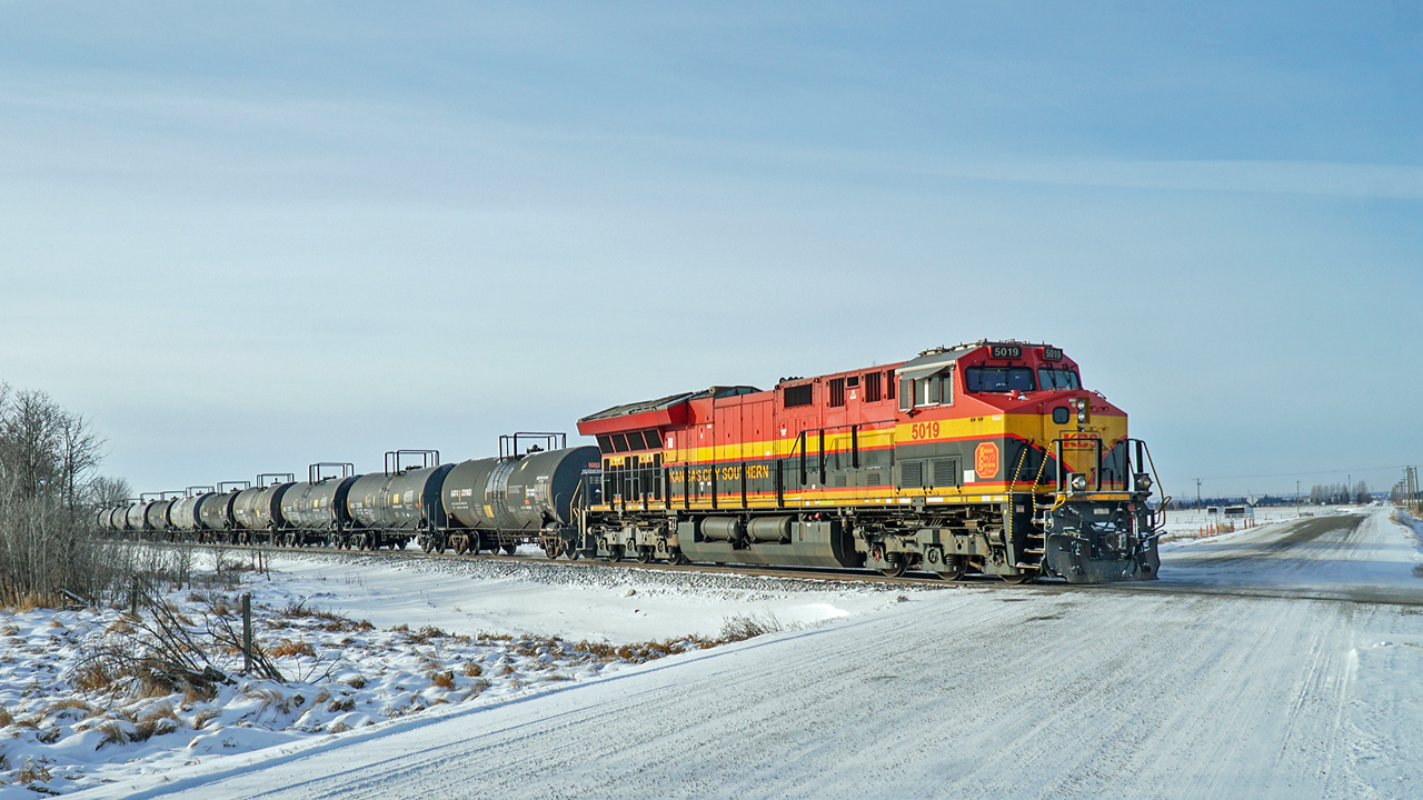 CPKC local train B18 crossing TWP 540 in rural Strathcona County.  KCS 5019  is the rear DP.