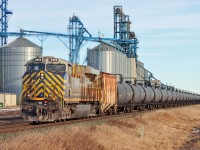 CN 3955 is the rear DP on an oil train passing the Gaudin Elevator on route to the Bruderheim Energy Terminal.