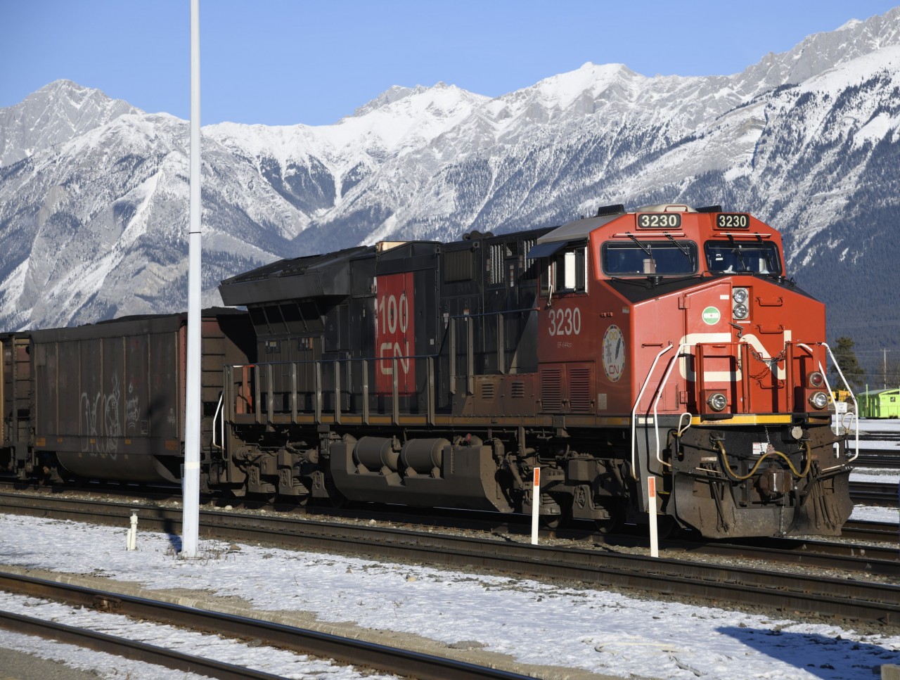 Waiting for a fresh crew  
Leading a loaded coal train, CN 3230 EF-644zc sits in front of the VIA station in Jasper, AB November 26, 2023 waiting for a new crew to continue the journey west.