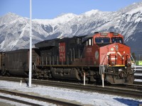 <b> Waiting for a fresh crew </b> <br>
Leading a loaded coal train, CN 3230 EF-644zc sits in front of the VIA station in Jasper, AB November 26, 2023 waiting for a new crew to continue the journey west.