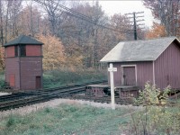 Here is another great shot of an era long gone- the control tower at the CNR Halton sub and CPR Galt sub diamond. Since the CNR Halton sub highline was built by-passing this diamond, the tower and old freight shed became obsolete and boarded up before being torn down. Taken from my fathers collection.