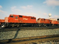 CP SD40-2 6039, M-636 4723, C-424 4214 and an RS18u are viewed at CP’s Agincourt Yard in Toronto, Ontario during an early winter morning. 