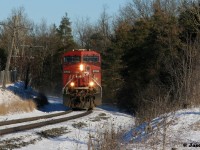 CP 137 is only light power seen having just crossed the Nith River bridge in Ayr, Ontario  as it approaches Wolverton on the Galt Subdivision. 