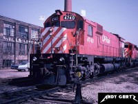 A CP westbound train with M636 4740 and SD40 5519 prepare to depart the west-end of CP's Quebec Street Yard in London. The building in the background was torn down in later years. 