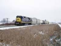 One of CSX's last trains on the CASO makes its way west through Canfield. Not that many years ago, you could see many NYC and C&O trains here, as well as Wabash "Red Balls" on the adjacent CN line. Now CSX is down to short trains three days a week in each direction and Norfolk Southern has been running through Hamilton since the middle of last year. Things will get even quieter when the last CSX train runs on February 29th.