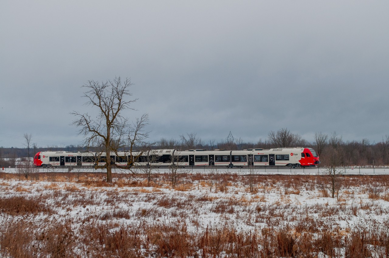 On January 26, 2024, a test train of the OC Tranpo (Capital Railway) Trillium line approaches the Limebank terminus station. The line's new trains were built at the Stadler factory in Switzerland.
