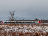 On January 26, 2024, a test train of the OC Tranpo (Capital Railway) Trillium line approaches the Limebank terminus station. The line's new trains were built at the Stadler factory in Switzerland.