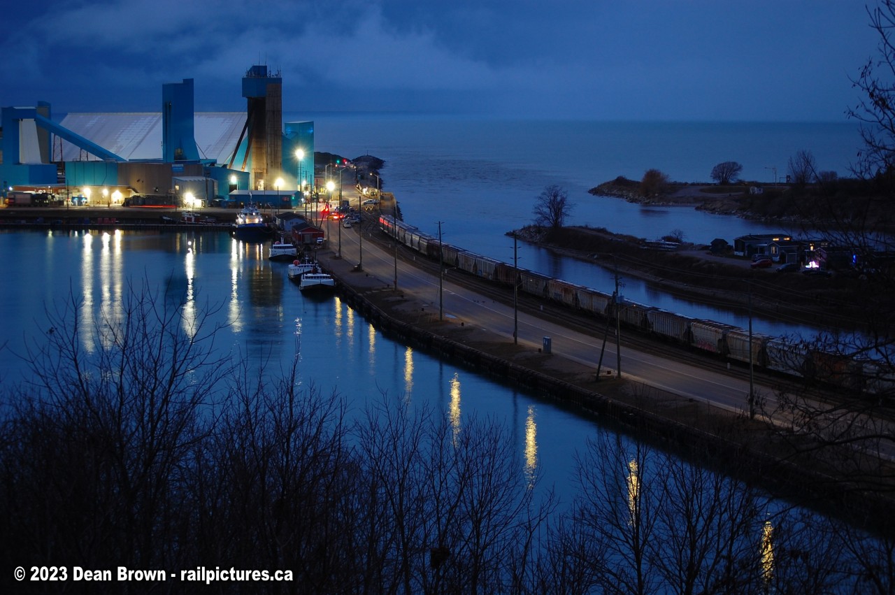 On a cold winter evening at Goderich, ON viewing the Compass Minerals’ Goderich salt mine as 40ft Covered hoppers waiting to be loaded with salt to be shipped out by GEXR.