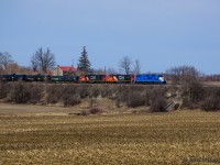 The stonemason's craft is displayed well at Mosborough, with the much-photographed house in the distance, and the 1855 Grand Trunk culvert visible amid the leafless brush.  CN L540 splits the scene on its way to Guelph.